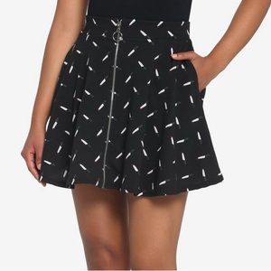 BRAND NEW black skater skirt with knives and a zipper